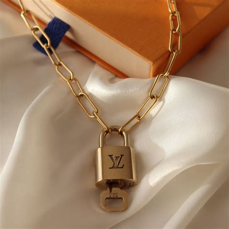 louis vuitton lock pendant|Louis Vuitton lock necklace.